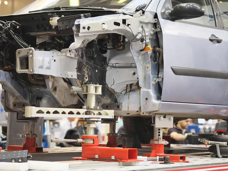 showing frame straightening on a car